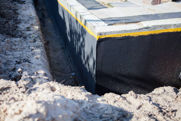 Professional Basement Waterproofing technician working in Ansonia, OH